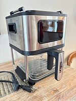 Oven main unit with stainless steel body, glass bowl, detachable power cord shown