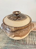 Casserole with lid in place, showing exterior glaze and handles