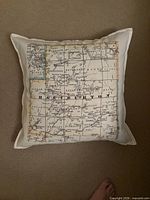 Front view of pillow showing full Haliburton County map graphic