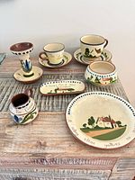 group shot of all nine Torquay pottery pieces