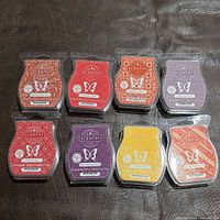 Front view of eight Scentsy wax melt bars