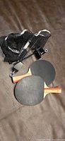Full set: two paddles, net, posts, clamps, bag