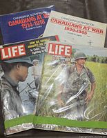 Front view showing two LIFE magazines and two Canadiana Scrapbook books
