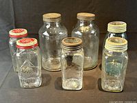 Group view of all jars showing quantity, shapes, embossing and lid colours