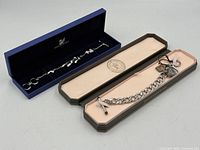 Both boxed bracelets side by side