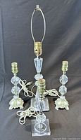Group shot of four crystal boudoir lamps showing bases and cords