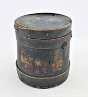 Full view of bucket with lid showing overall form and paint