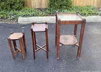 All three plant tables standing side by side outdoors