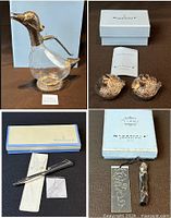 Group shot showing decanter, quail shakers, pen, bookmark with their boxes
