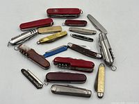 All 18 knives arranged to show variety and scale