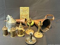Group shot showing all copper, brass and pewter items together