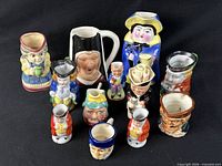 Group shot of all eleven miniature jugs