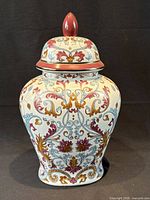 front view of ceramic lidded jar showing pattern and lid