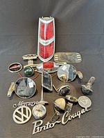 Full lot overview showing tail light assembly, mirrors, emblems and lights