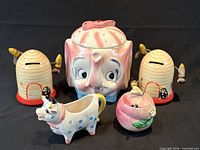 Group view of all five ceramic kitchenware items