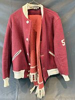 Front view of jacket with scarf draped