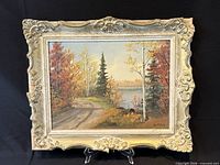 Full view of framed oil painting