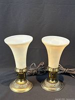 Both brass torchiere lamps front view with cords visible