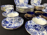 Angle view highlighting Blue Willow cups, plates, and cobalt additions