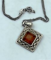 Close-up of chain, clasp marked 925 and pendant front