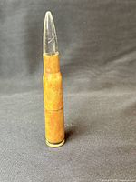 Full view of cartridge lighter with clear tip