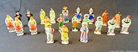 All 22 porcelain figurines displayed together
