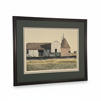 Angled full view of framed lithograph showing frame style and mat