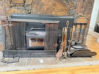 Overall view showing screen, tool set, log basket and loose tools