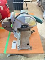 Overall view of Makita LS1020 miter saw on table
