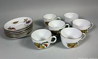 Group shot of all six teacups and six saucers