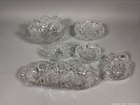 Group shot of all six cut glass pieces