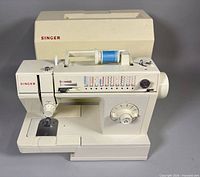 Front view of Singer Merritt 4538C sewing machine with cover