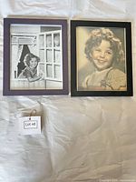 Front view of framed black and white child portrait in two-tone frame