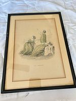 Front view of framed lithograph with mat and image visible