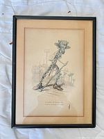 Front view of framed lithograph under glass