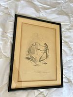 Front view of framed lithograph showing artwork, matting, and frame