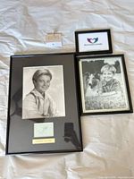 Three framed items: main Tommy Rettig portrait with autograph, additional Rettig photo with collie, small heart graphic print