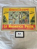 Full view of framed horizontal poster showing title, stars, Cinemascope banner
