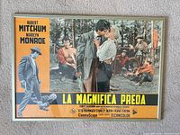 Front view framed poster showing artwork and credits