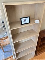 Front view showing full height and shelf configuration