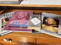 Group shot of all five Marilyn Monroe photobooks