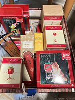 Box overview showing multiple boxed ornaments and wooden sleds