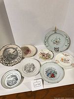 Group shot of all eight plates and bowls