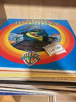 Stack of Warner Bros LPs, top record Leon Redbone "On the Track" with Lot sticker visible