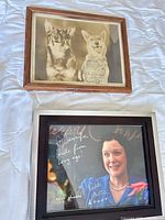 Front view of both framed photographs