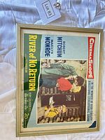 Front view of framed River of No Return poster