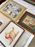 Front view of all three framed animal prints