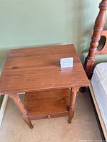 Front and side view of solid wood end table showing drawer and shelf