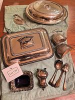 All items laid out on cloth showing entire lot