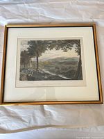 Front view of framed engraving showing image, mat and frame